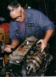 Installing piston and rod.