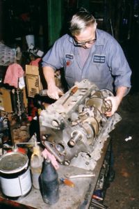 Installing piston and rod.