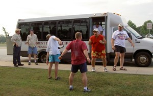Group around the bus at rest stop